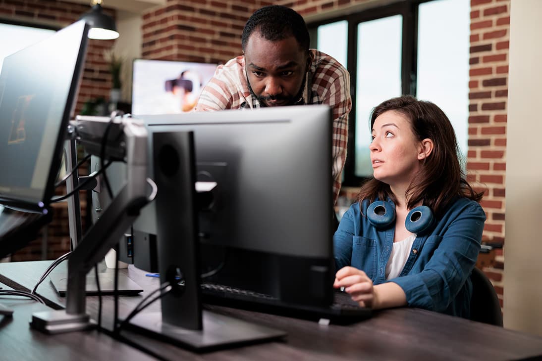 A developer working efficiently at a modern workstation
